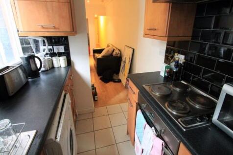 A well-maintained kitchen with ample counter sp...