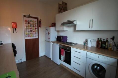 A modern, well-maintained kitchen featuring amp...