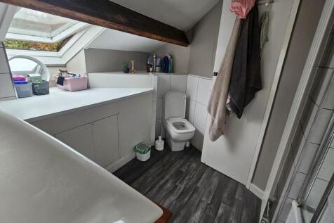 A modern bathroom featuring a clean and well-ma...