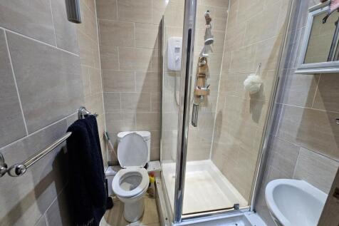 A modern, well-maintained bathroom featuring a ...