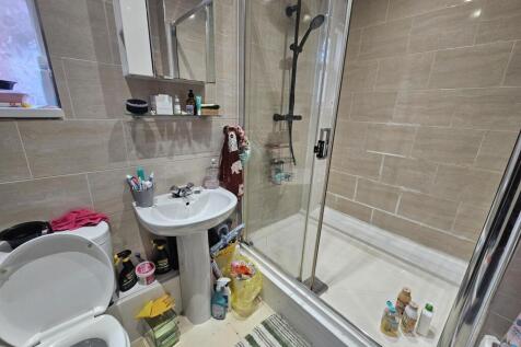 Modern bathroom with a shower enclosure, clean ...