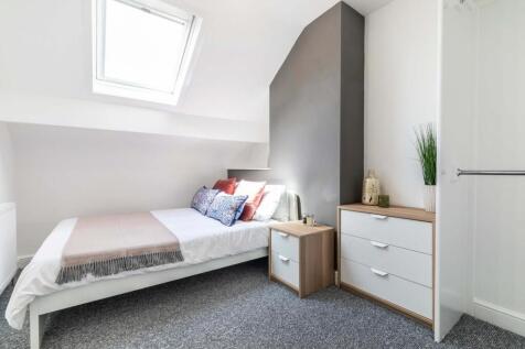 A clean and functional bathroom with a WC, offe...