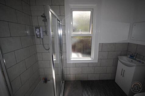 A clean and well-maintained bathroom with a lar...