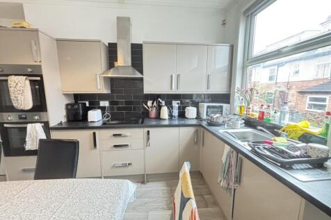 Bright modern kitchen with plenty of worktop sp...