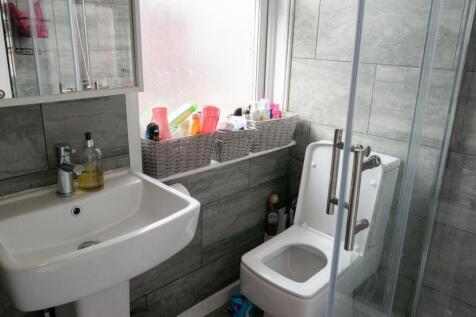 A clean and well-maintained bathroom with a lar...