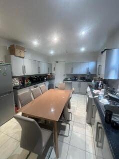 Bright and well-maintained kitchen with modern ...