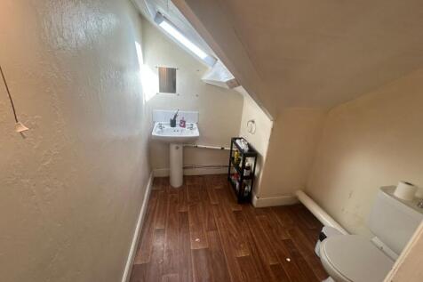 A clean and well-maintained bathroom featuring ...