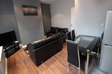 Contemporary living room featuring sleek black ...