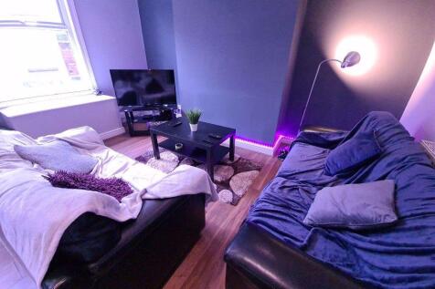 A cozy living room featuring two comfortable so...