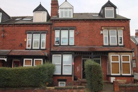 A charming facade of a traditional brick row ho...