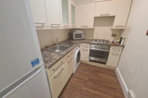 A modern, well-maintained kitchen area featurin...
