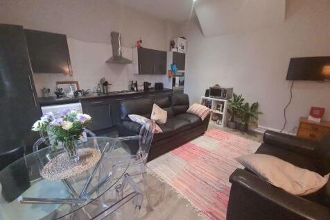 A welcoming living room with comfortable seatin...