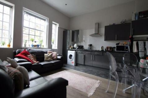 A bright and stylish contemporary living room f...
