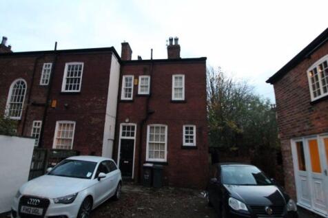 A charming view of the front exterior of a trad...