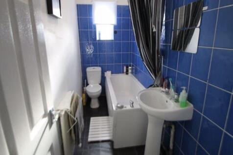 A clean and well-maintained bathroom featuring ...
