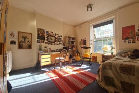 Bright and welcoming living room filled with na...