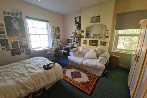 A cozy and inviting living room filled with nat...