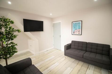 Modern and welcoming living room featuring comf...