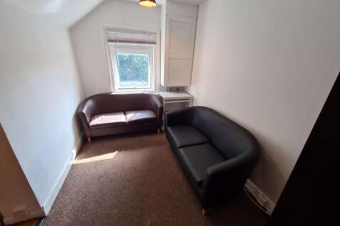 A cozy living room featuring two comfortable so...