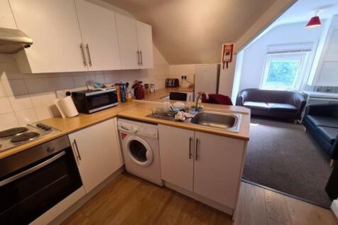 A modern, well-maintained kitchen with ample st...