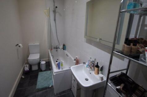 A clean and well-maintained bathroom featuring ...