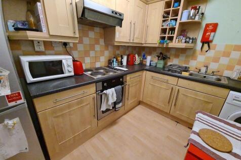 Bright and functional kitchen space featuring a...