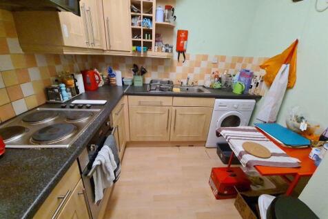 Bright and functional kitchen featuring ample c...