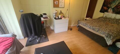 Bright and inviting master bedroom featuring a ...