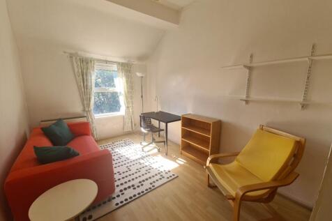 Bright and inviting living room featuring a com...