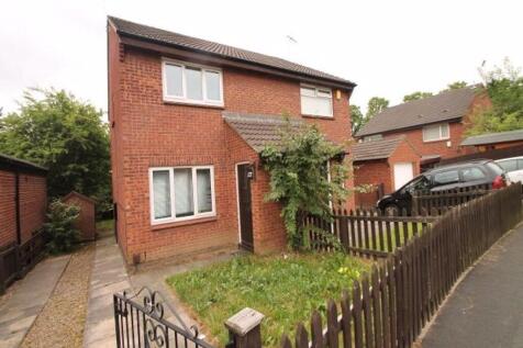 A charming red brick house with well-maintained...