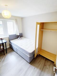 Bright, freshly decorated single bedroom with a...