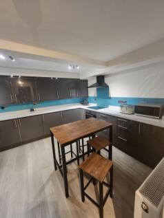 Modern and well-maintained kitchen with sleek d...