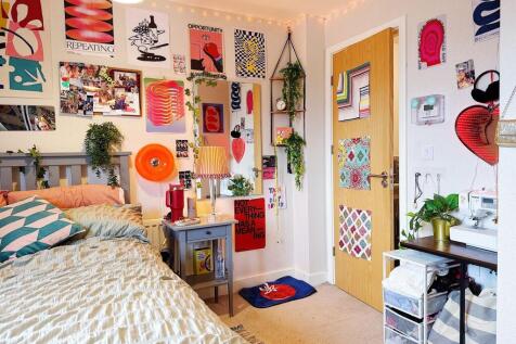 Bright, characterful bedroom with a comfortable...