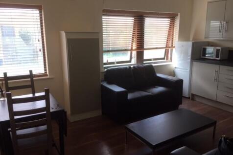 Bright and spacious living area featuring a com...