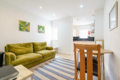 Bright and inviting living room featuring a vib...