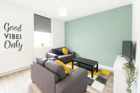 Bright and inviting living room featuring moder...