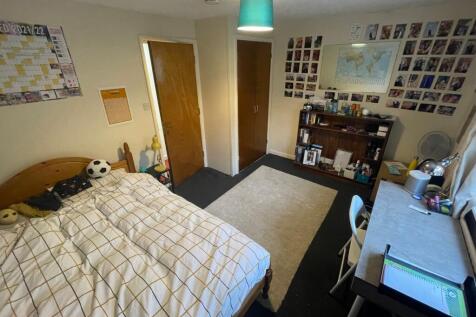 A spacious and inviting double bedroom, perfect...