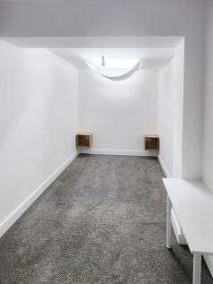 Bright, freshly painted single bedroom with neu...