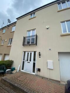 Photo of the front exterior of a modern, well-m...