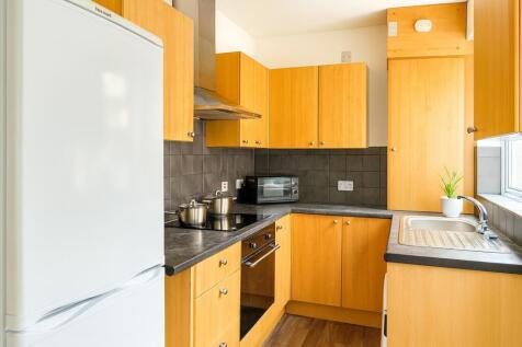 A bright and well-maintained kitchen featuring ...