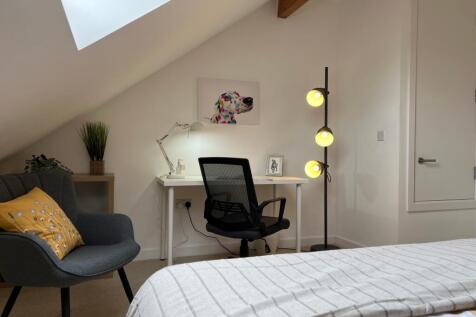 A spacious and inviting large double bedroom wi...