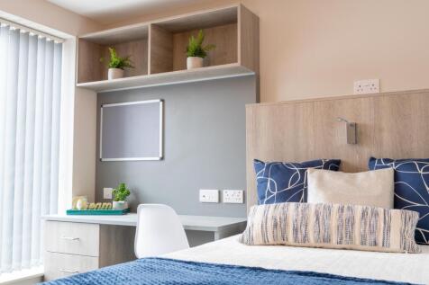 A stylish and inviting double bedroom featuring...