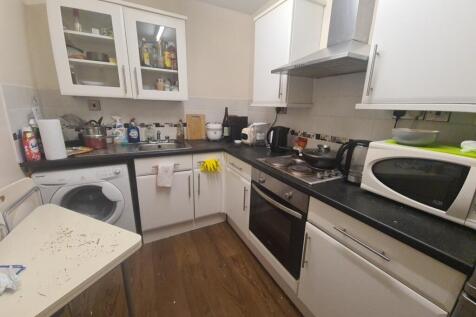A well-maintained kitchen with modern appliance...