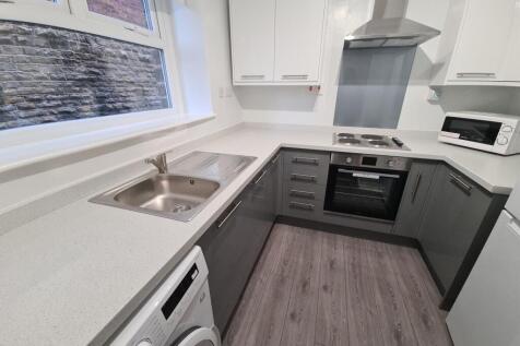 A modern, well-maintained kitchen with ample co...