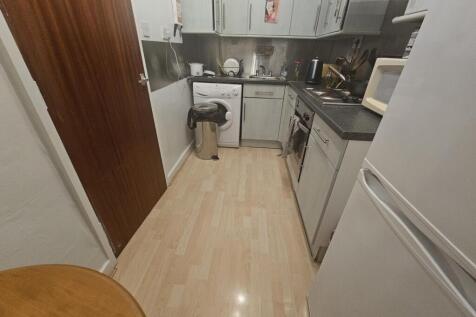 A compact but functional kitchen area with mode...