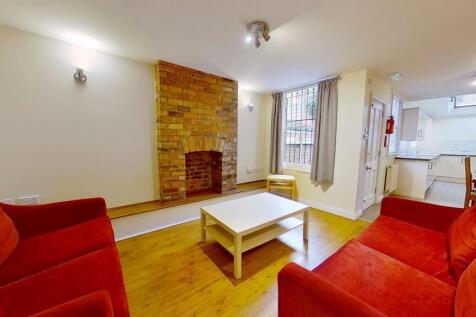 Bright, well-presented living room with wooden ...