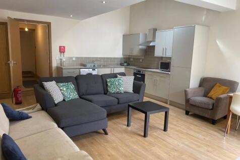 Bright and spacious living room featuring moder...