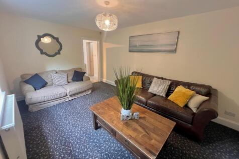 A spacious and inviting living room perfect for...