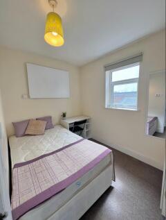 A cozy and inviting double bedroom, perfect for...