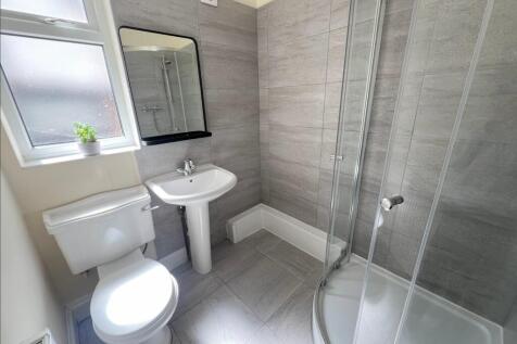 A modern and clean bathroom featuring a stylish...